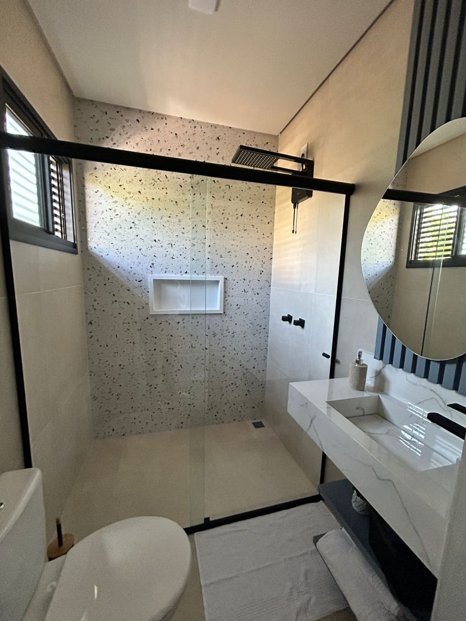 Shower, towels, toilet paper