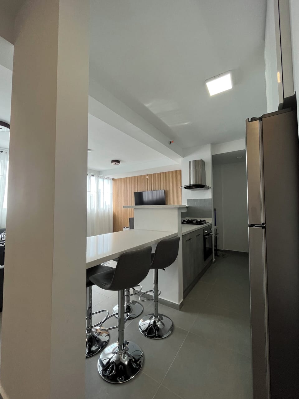Signature Condo, Ocean View (109) | Living area | 126-cm TV with cable channels