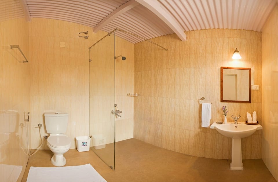 Barbet | Bathroom | Shower, rainfall showerhead, towels, soap