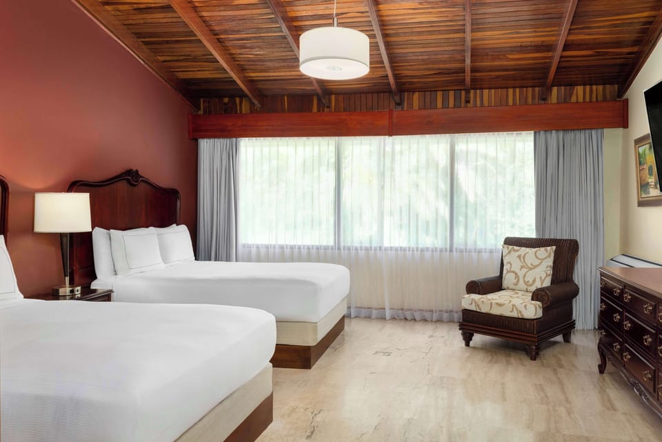 2 Bedroom Pres. Suite, Jetted tub and Sauna, Business Lounge Access | Hypo-allergenic bedding, in-room safe, desk, blackout drapes