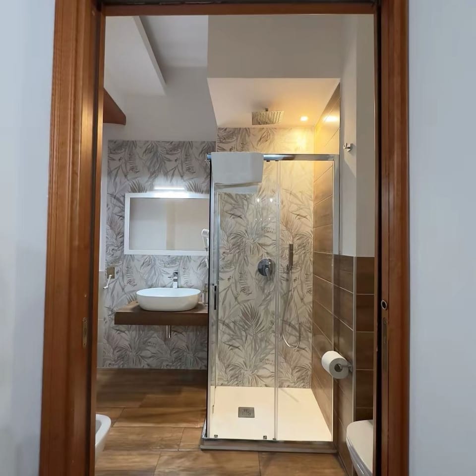 Standard Room | Bathroom | Shower, hair dryer, bathrobes, slippers