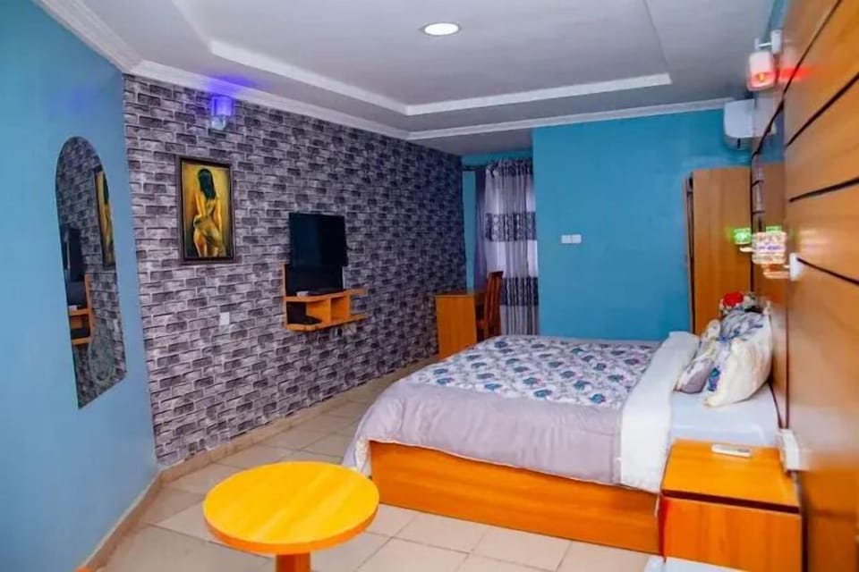 Deluxe Room, Balcony, City View | Desk, laptop workspace, blackout drapes, soundproofing