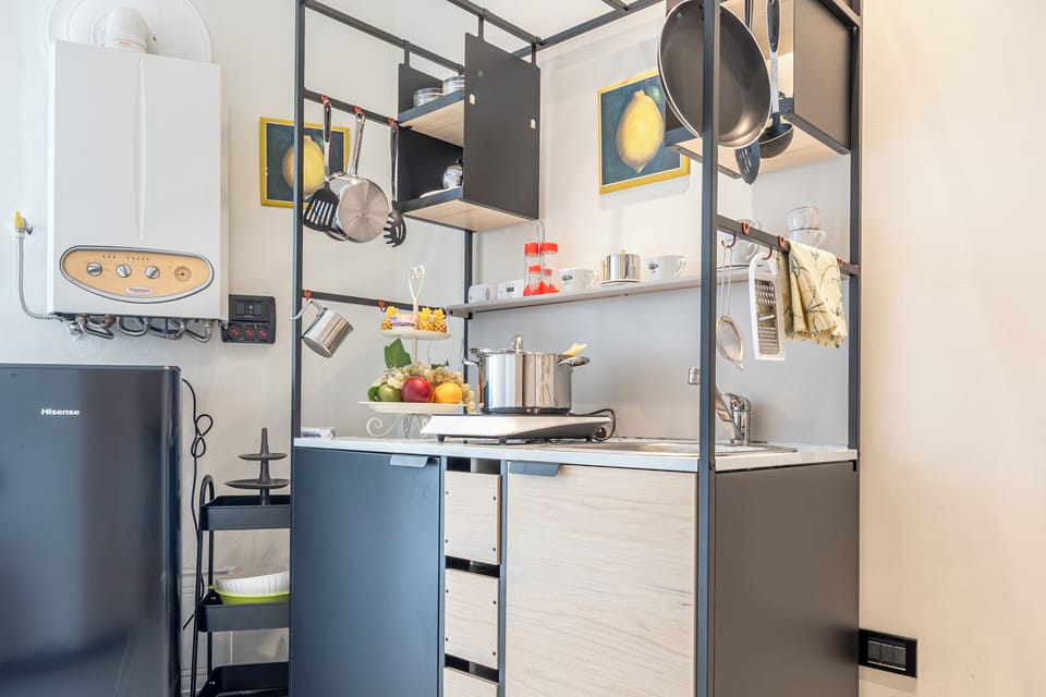 Apartment | Private kitchen | Fridge, stovetop, espresso maker, cookware/dishes/utensils