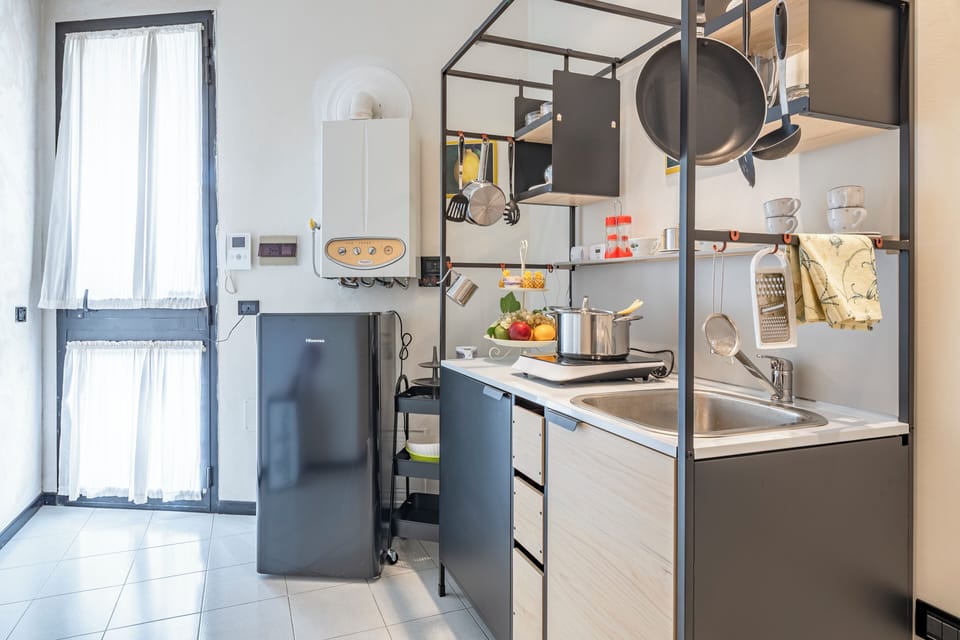 Apartment | Private kitchen | Fridge, stovetop, espresso maker, cookware/dishes/utensils
