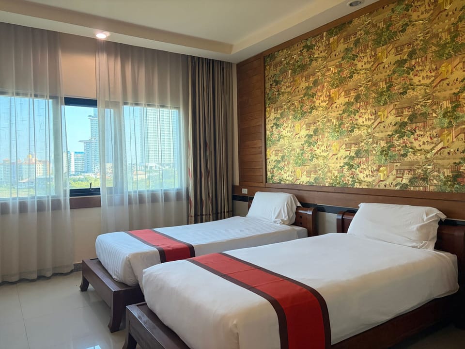 Premium bedding, desk, laptop workspace, free WiFi