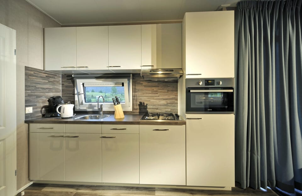 Classic Mobile Home, 2 Bedrooms | Private kitchen | Fridge, microwave, dishwasher, coffee/tea maker