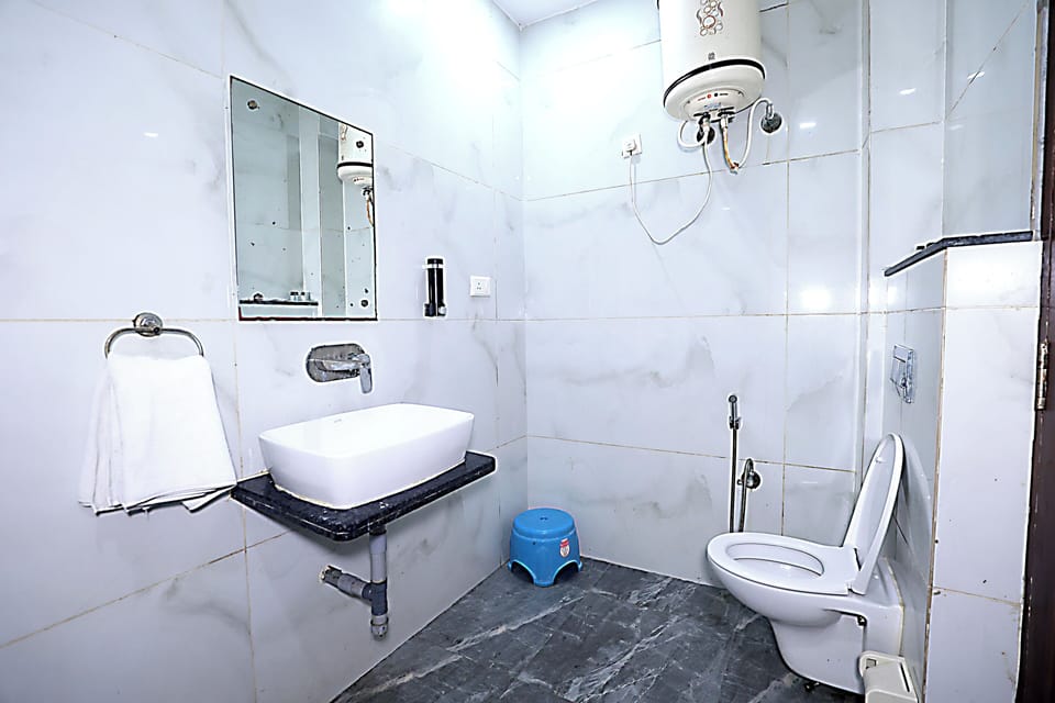 Shower, towels, soap, toilet paper