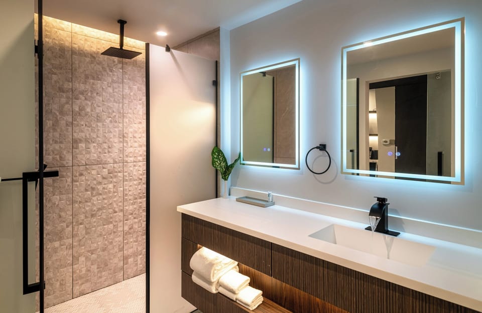 Standard Room, 2 Queen Beds, Pool View | Bathroom | Shower, hair dryer, bathrobes, slippers
