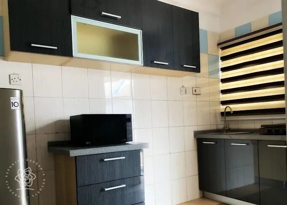 Family Room, Balcony, City View | Private kitchen | Mini-fridge
