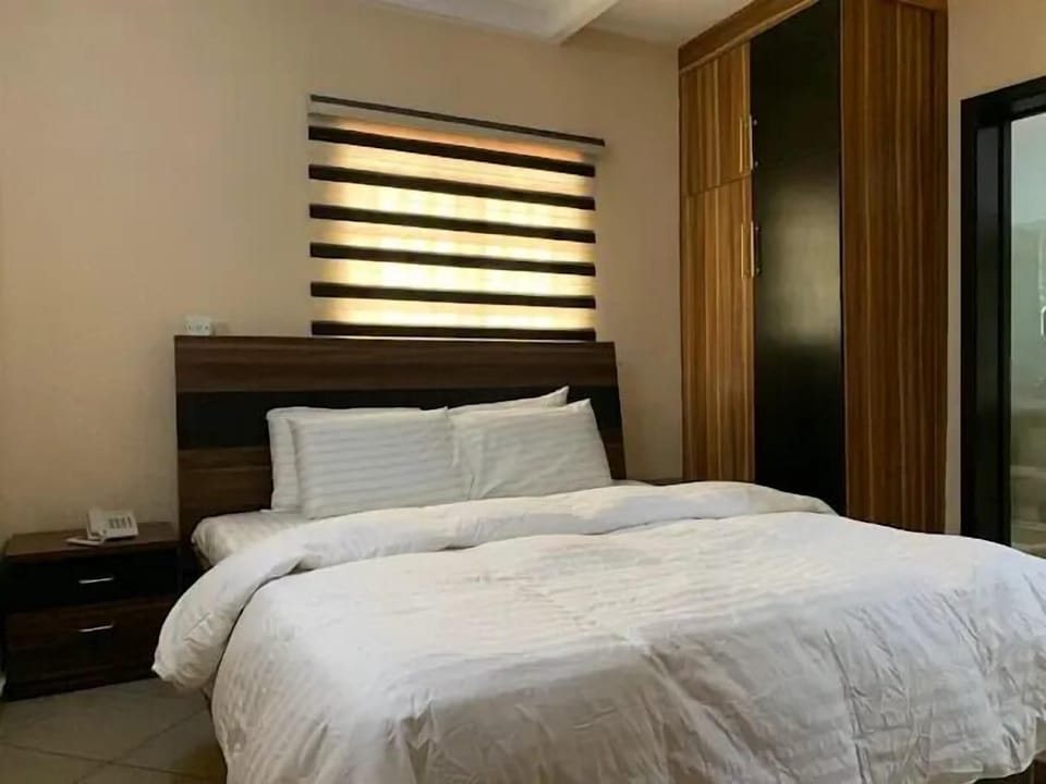 Family Room, Balcony, City View | Desk, laptop workspace, soundproofing, free WiFi