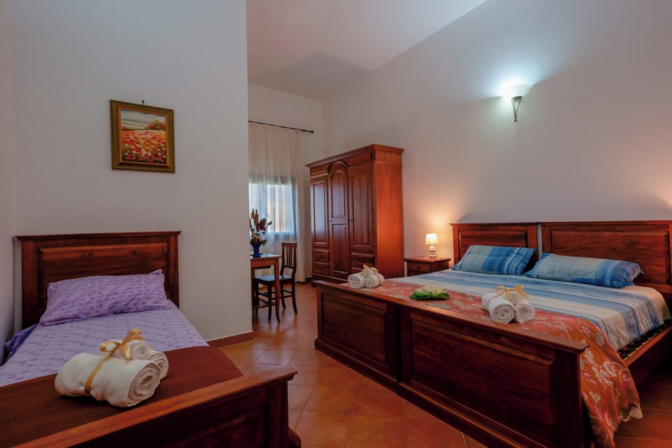 Deluxe Triple Room, Multiple Beds, City View | Desk, soundproofing, iron/ironing board, free WiFi