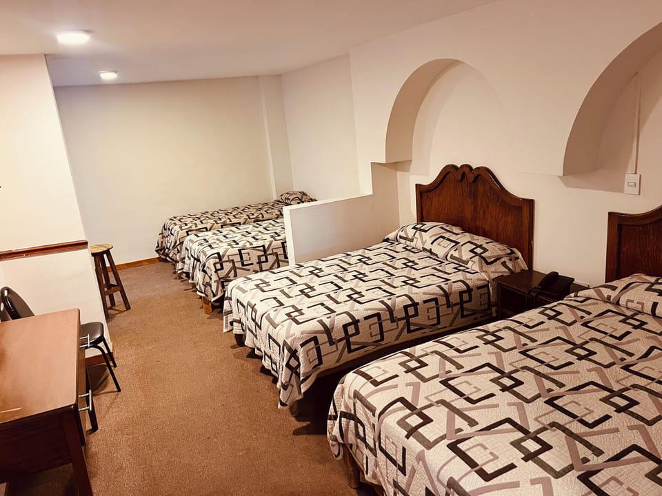 Basic Quadruple Room | Free WiFi, bed sheets