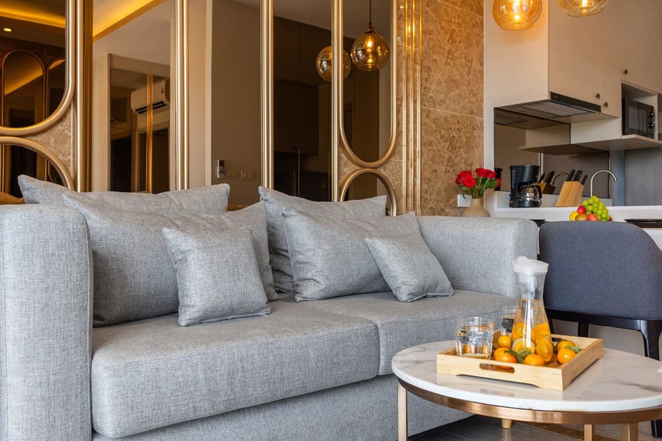 Design Apartment, Balcony, Lagoon View | Memory foam beds, in-room safe, laptop workspace, iron/ironing board
