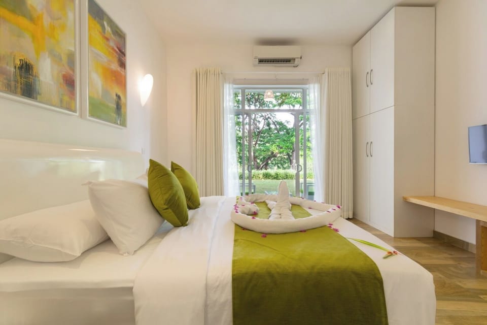 Luxury Suite, River View | In-room safe, blackout drapes, iron/ironing board, free WiFi