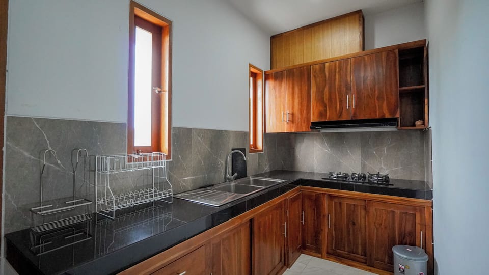 Deluxe Double Room, Garden View | Private kitchen | Fridge, microwave, stovetop, dishwasher