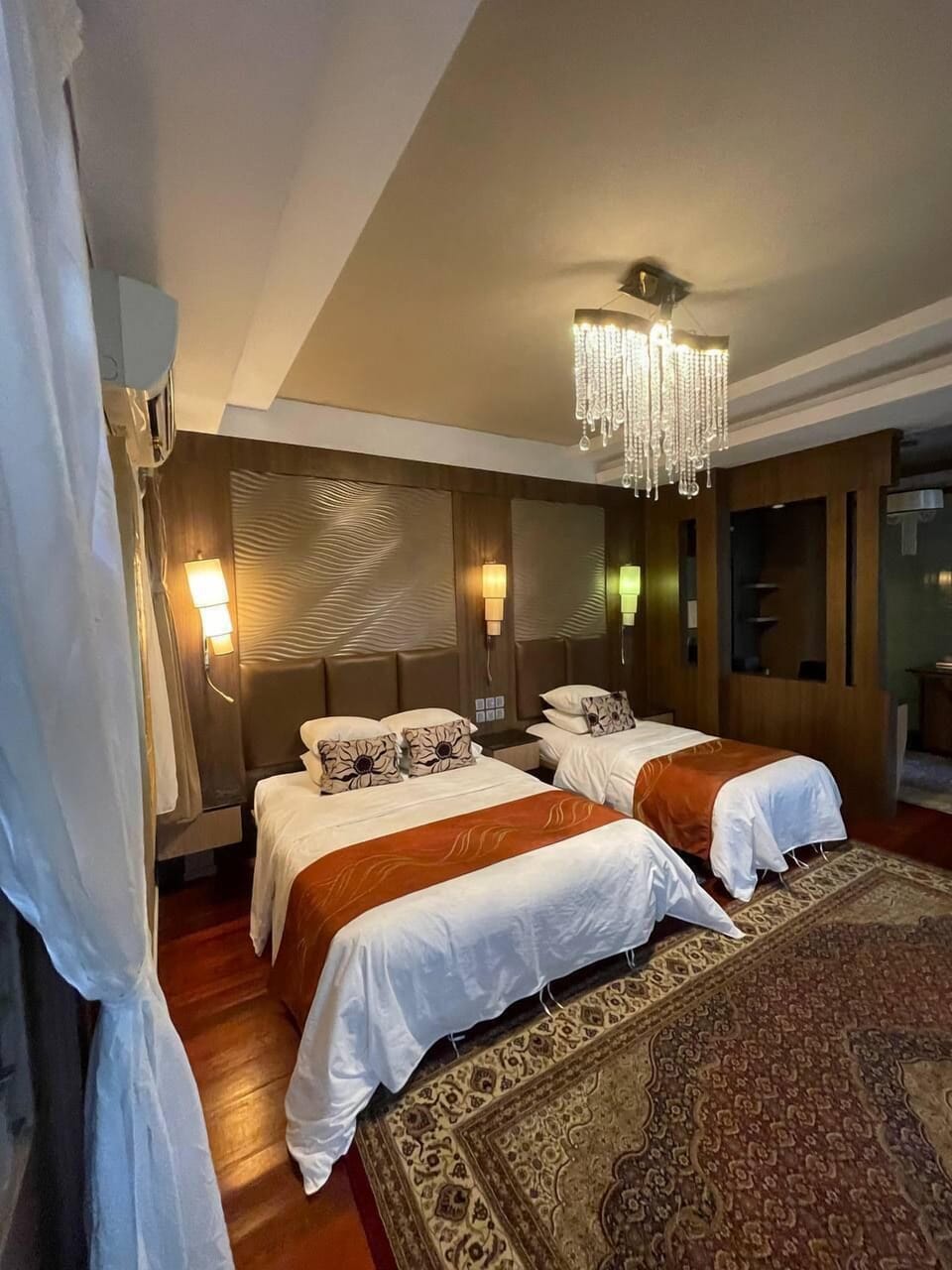 Premium Triple Room | Desk, bed sheets
