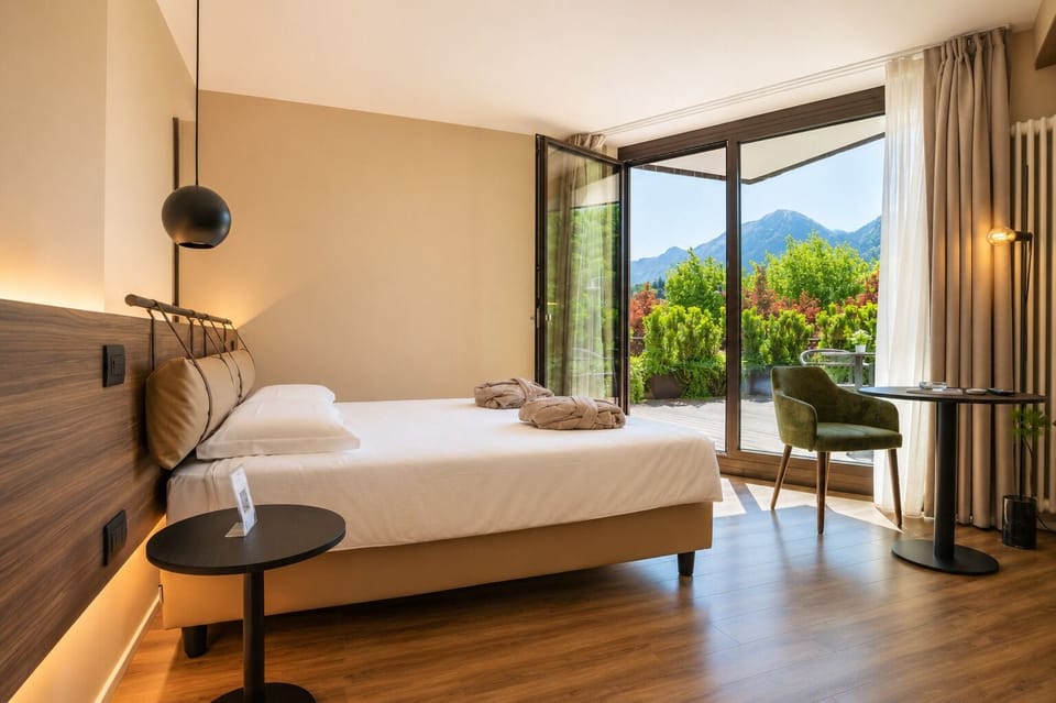 Junior Suite, Terrace, Mountain View | Minibar, in-room safe, desk, laptop workspace