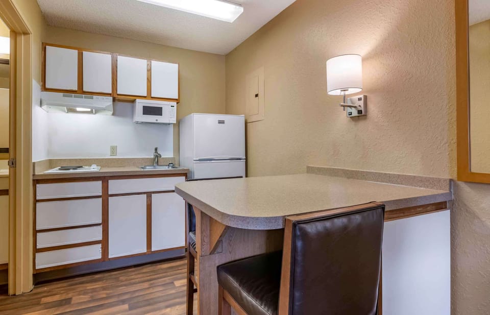 Studio, 1 Queen Bed, Non Smoking | Private kitchen | Fridge, microwave, stovetop