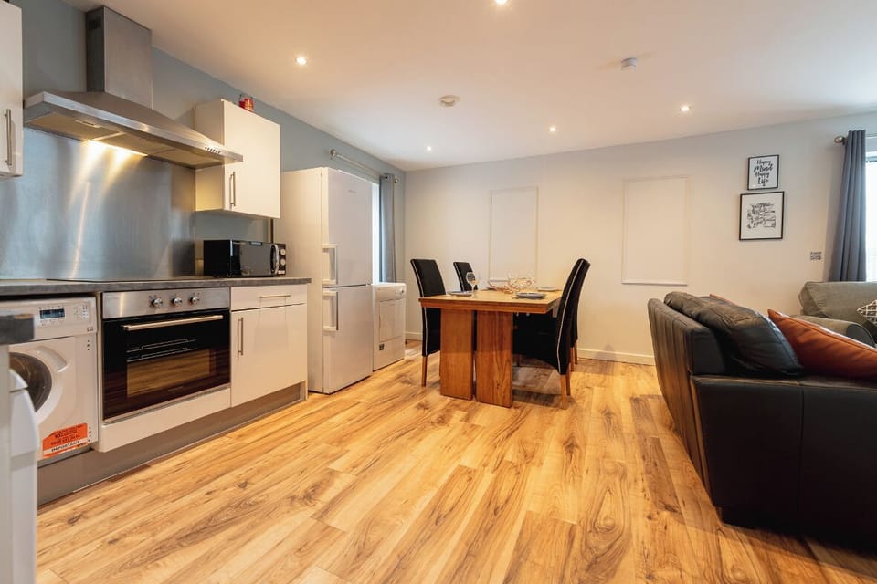 Comfort Apartment | Living area | Flat-screen TV