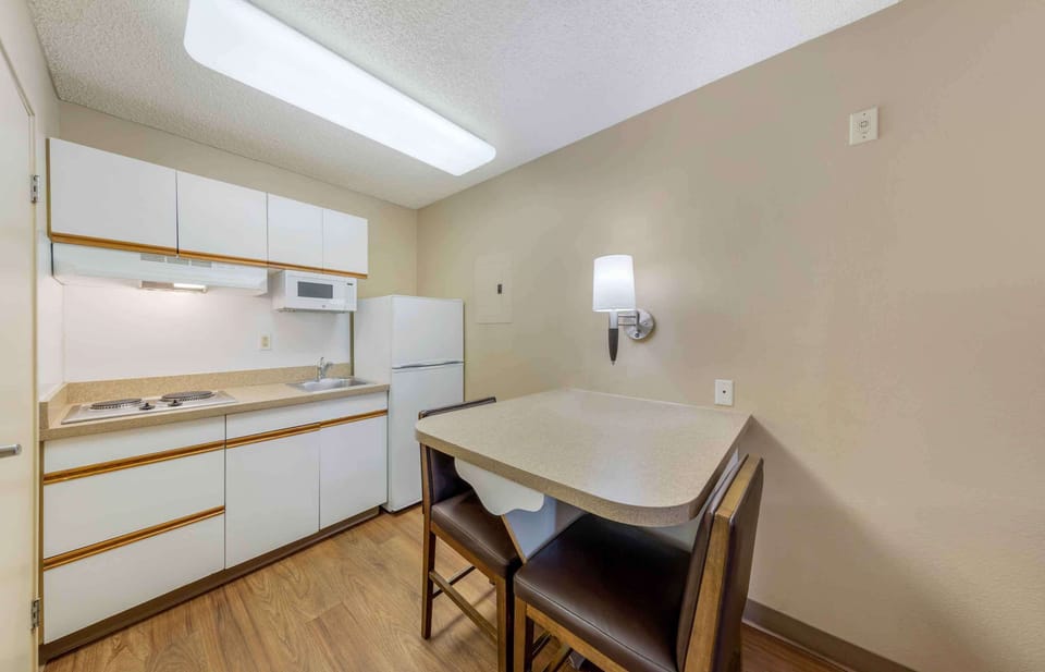 Studio, 1 Queen Bed, Non Smoking | Private kitchen | Fridge, microwave, stovetop, coffee/tea maker