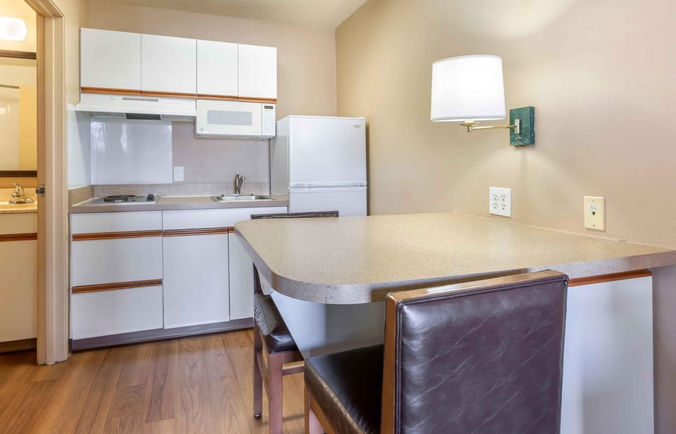 Studio, 1 Queen Bed, Non Smoking | Private kitchen | Fridge, microwave, stovetop