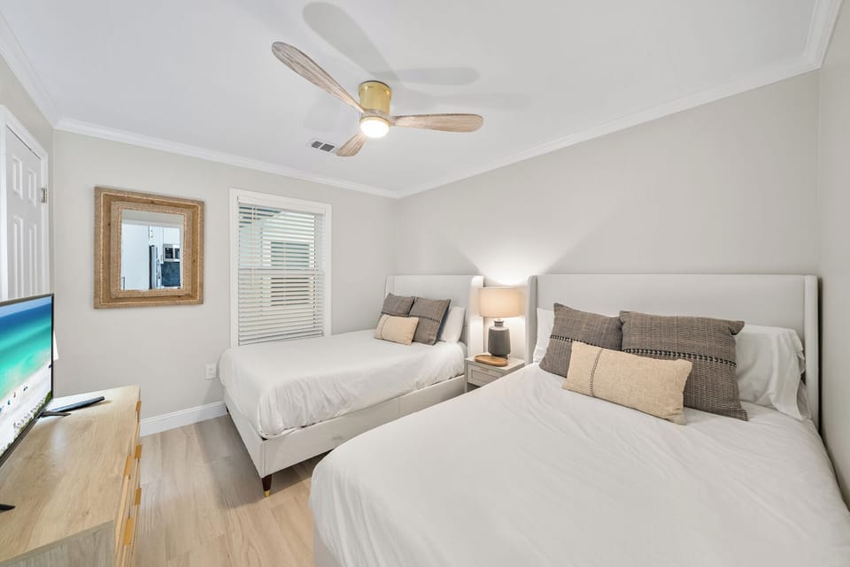 Condo, Multiple Beds, Balcony, Garden View (Beachside Villas 811) | 2 bedrooms, individually decorated, individually furnished