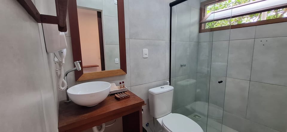 Deluxe Double Room, 1 King Bed | Bathroom | Shower, hair dryer, towels, soap