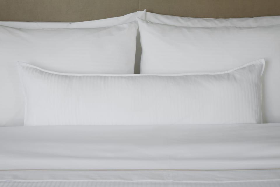 Premium bedding, down comforters, in-room safe, desk