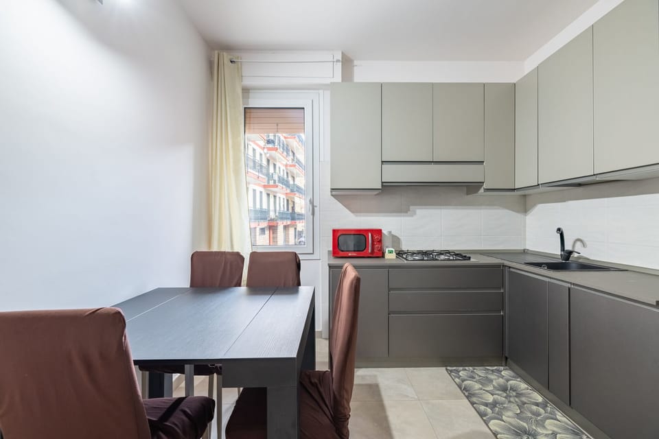 Apartment, Balcony | Private kitchen | Fridge, microwave, oven, stovetop