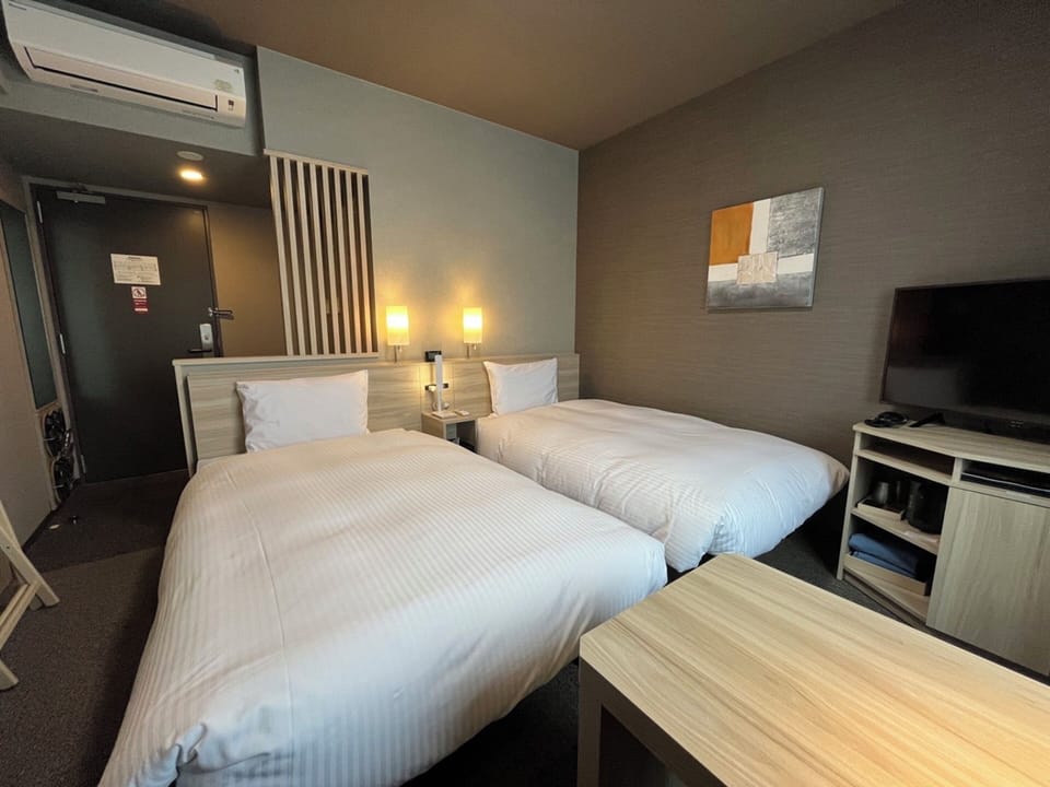 Twin Room, Non Smoking | Desk, laptop workspace, blackout drapes, iron/ironing board (on request)