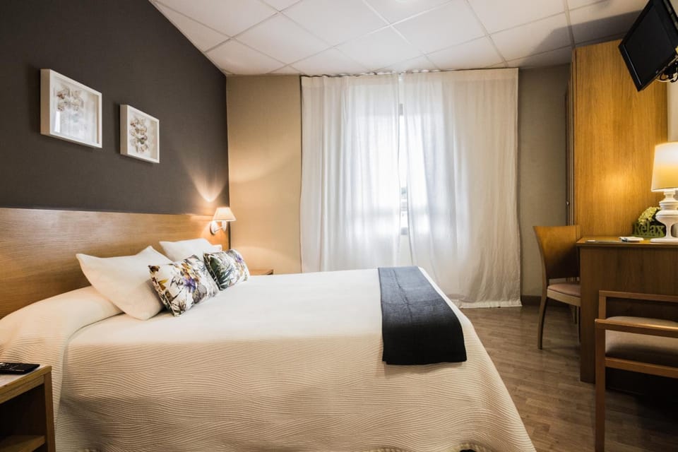 Desk, blackout drapes, iron/ironing board, free WiFi