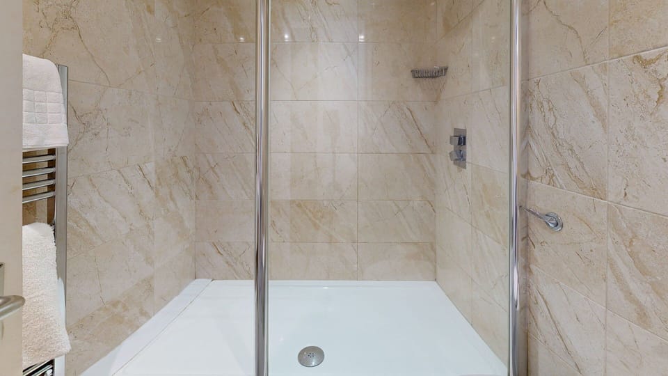 Shower, free toiletries, hair dryer, towels