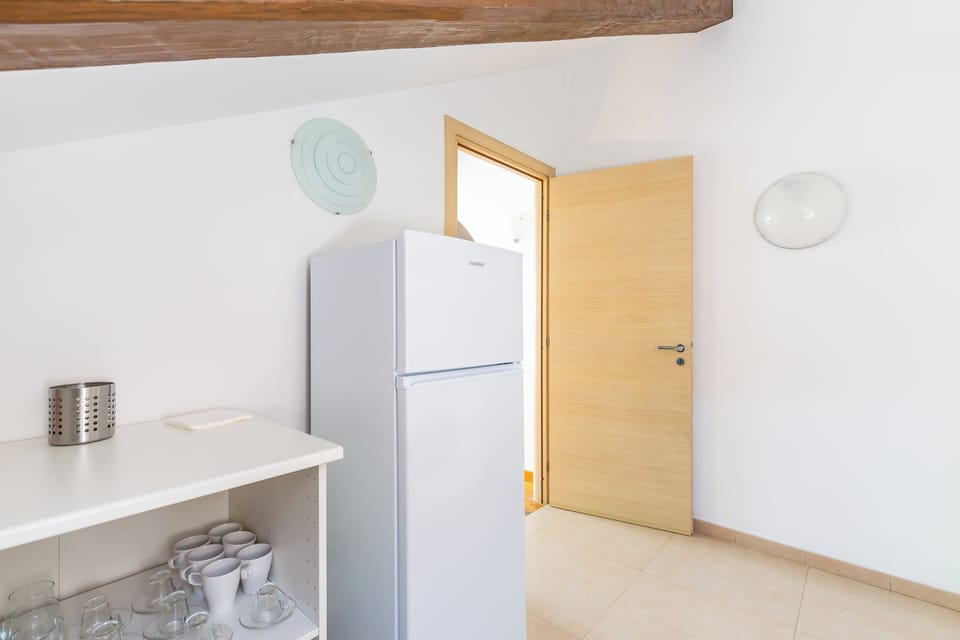 Apartment (2 Bedrooms) | Private kitchen | Oven, stovetop, electric kettle, cookware/dishes/utensils