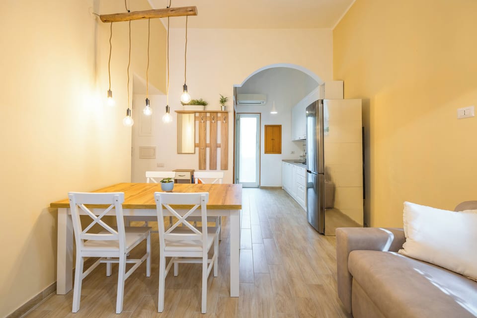 Apartment (2 Bedrooms) | Living area | 32-inch Smart TV with cable channels