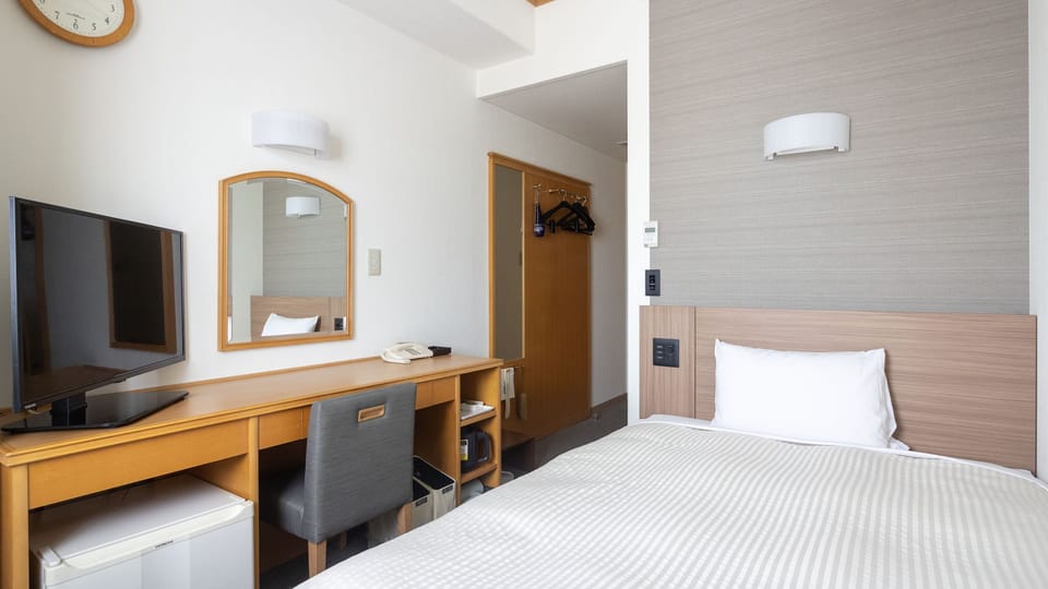 Desk, iron/ironing board (on request), WiFi (free), bed sheets