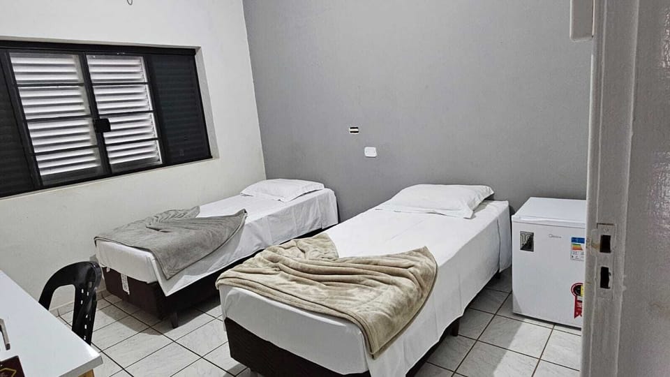 Twin Room, 2 Twin Beds, Private Bathroom | Desk, laptop workspace, free WiFi, bed sheets