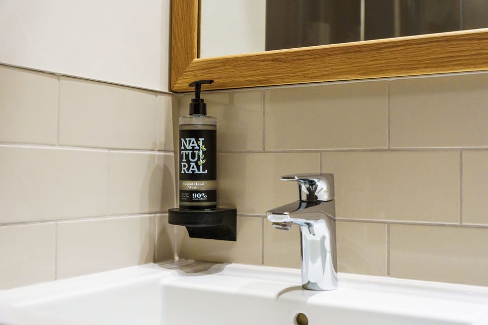 Rainfall showerhead, free toiletries, hair dryer, towels