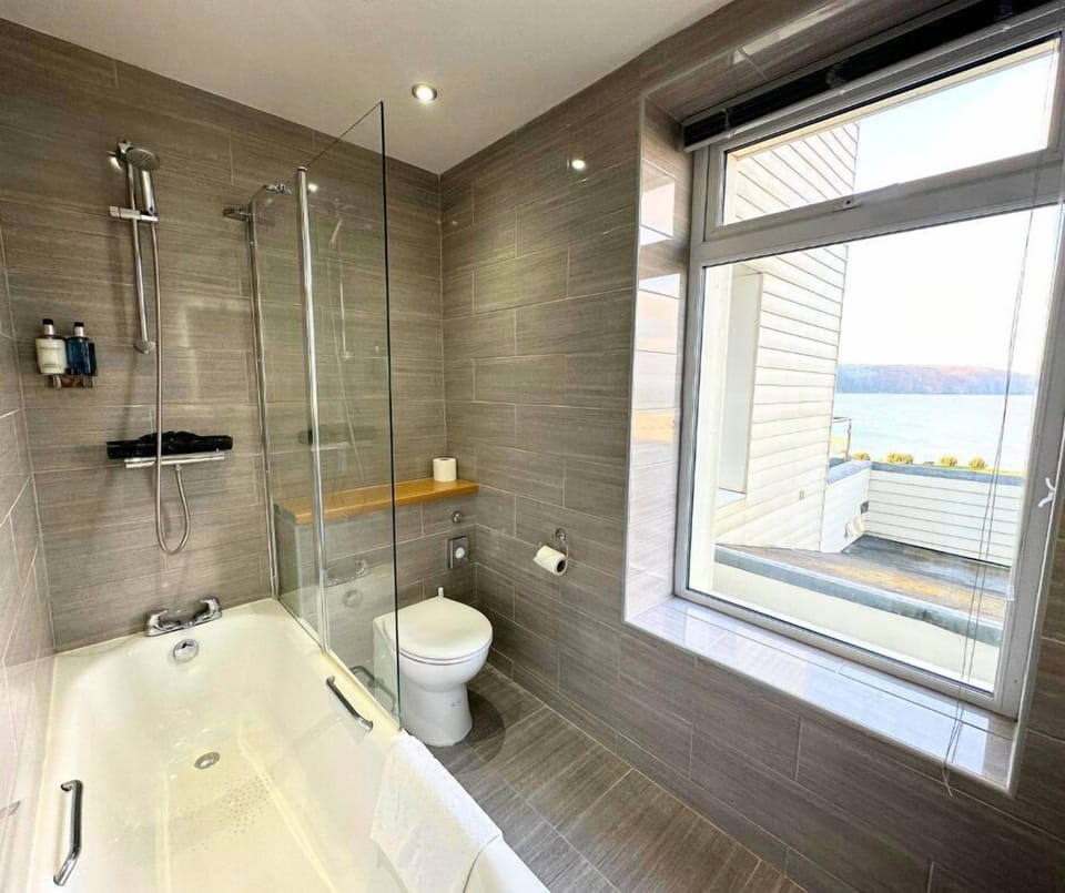 Family Room, Balcony, Sea View | Bathroom | Free toiletries, hair dryer, bathrobes, slippers