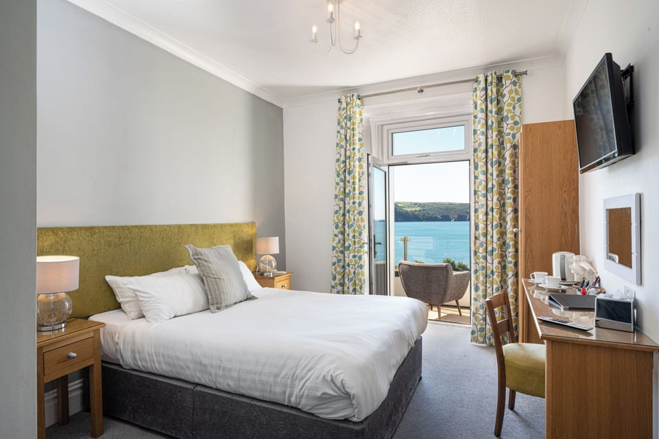 Double or Twin Room, Balcony, Sea View | Iron/ironing board, free WiFi, bed sheets