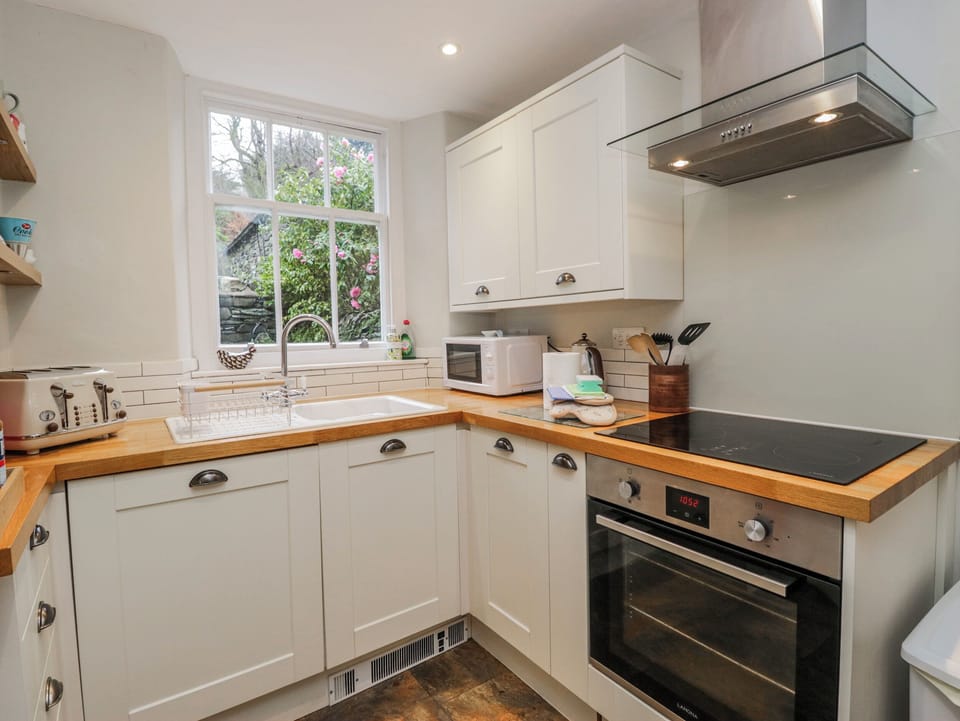 Fridge, microwave, toaster, cookware/dishes/utensils