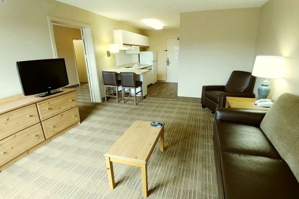 Suite, 1 King Bed with Sofa bed, Non Smoking | Pillowtop beds, desk, laptop workspace, blackout drapes
