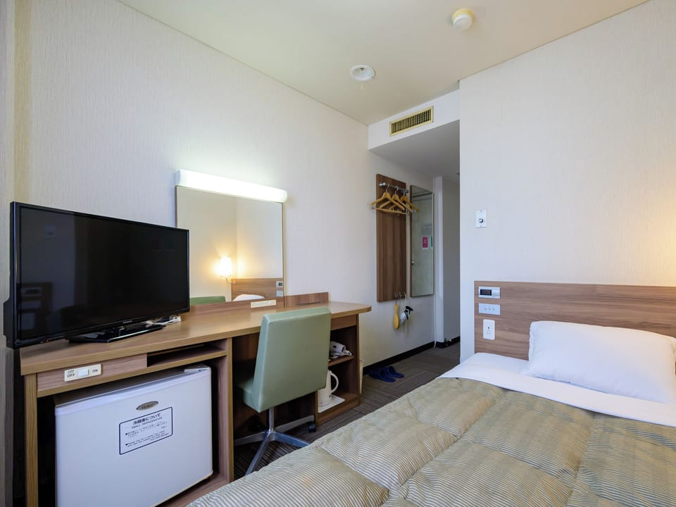 Semi Double Room | Desk, blackout drapes, iron/ironing board (on request), WiFi (free)