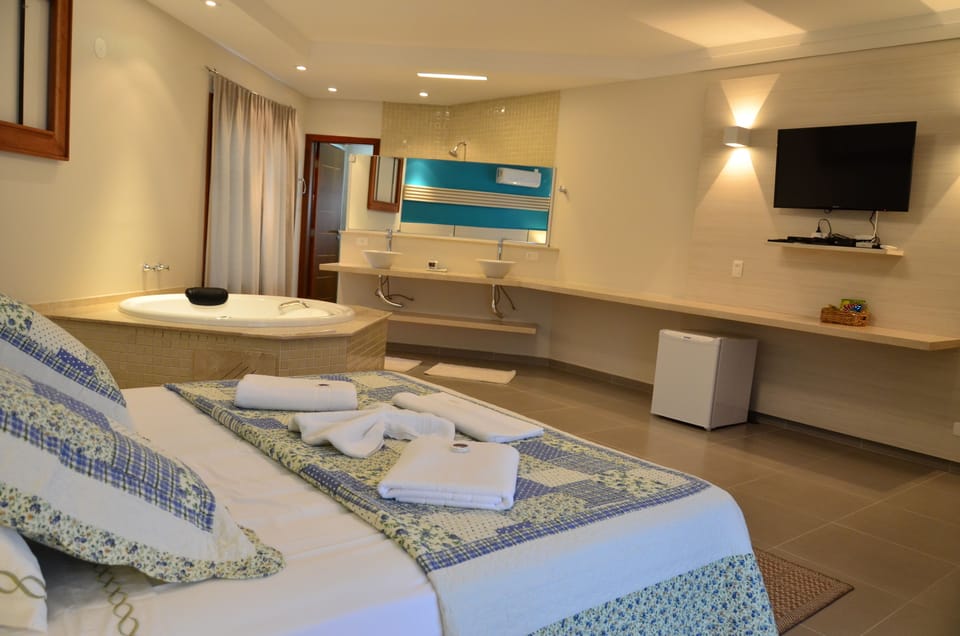 Deluxe Apartment, Jetted Tub | Minibar, individually decorated, individually furnished