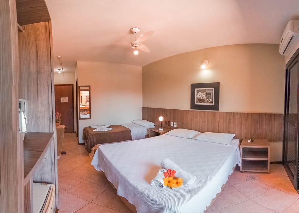 Standard Room | Minibar, in-room safe, desk, iron/ironing board