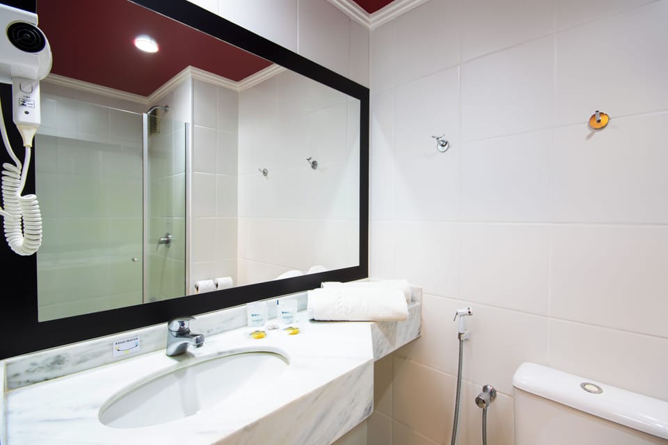 Basic Double Room, 1 Double Bed | Bathroom | Shower, hair dryer, towels