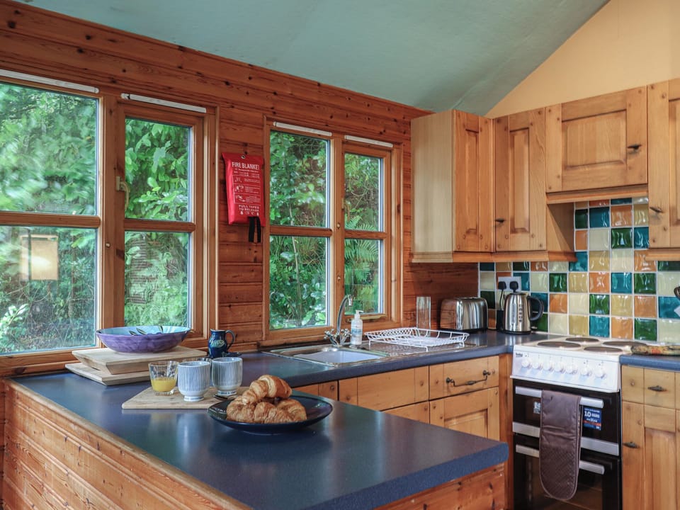 Fridge, microwave, toaster, cookware/dishes/utensils