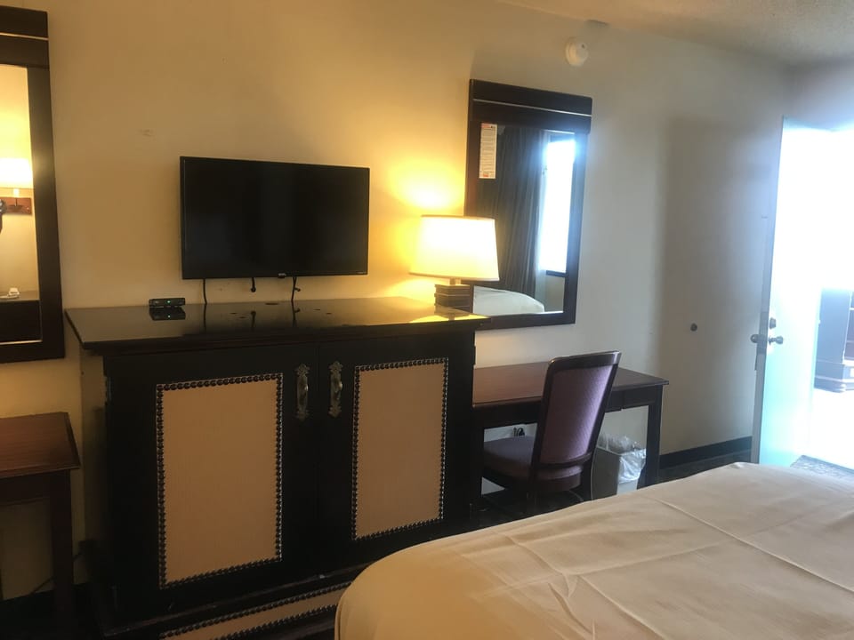 Room, Multiple Beds | Premium bedding, desk, iron/ironing board, free WiFi