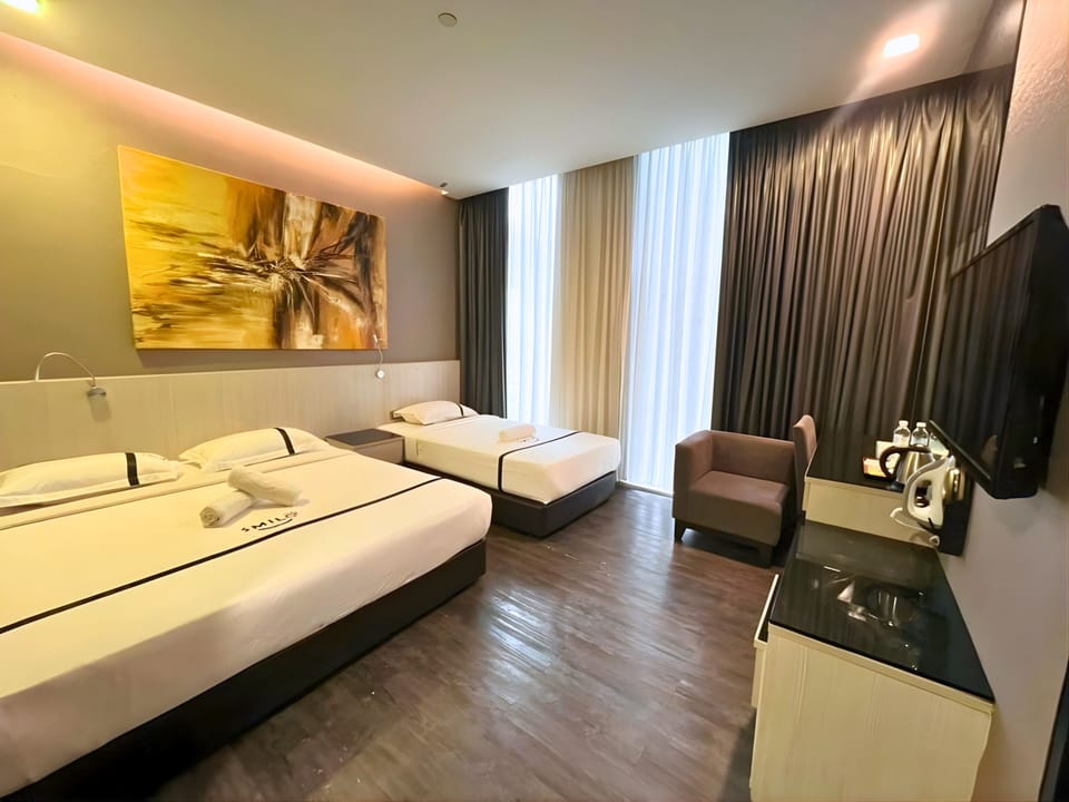 Family Room, Multiple Beds | Desk, iron/ironing board, free WiFi, bed sheets