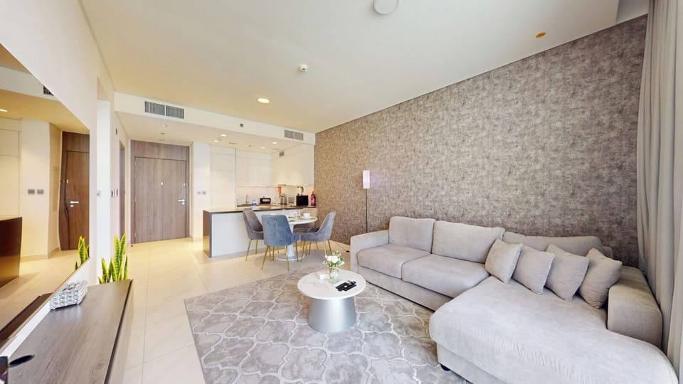 Luxury Apartment, Lagoon View | Living area | 55-inch Smart TV with digital channels