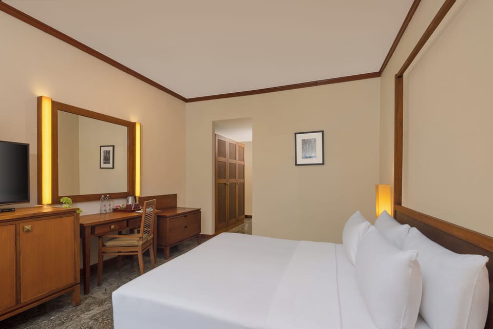 Deluxe Room, Multiple Beds, Garden View | Minibar, in-room safe, desk, blackout drapes
